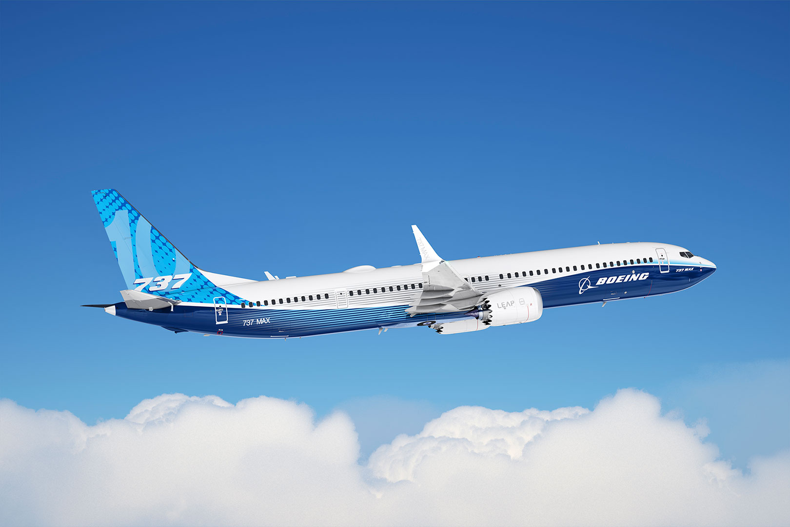 Boeing 737-10 Unified Livery In-flight Over Clouds